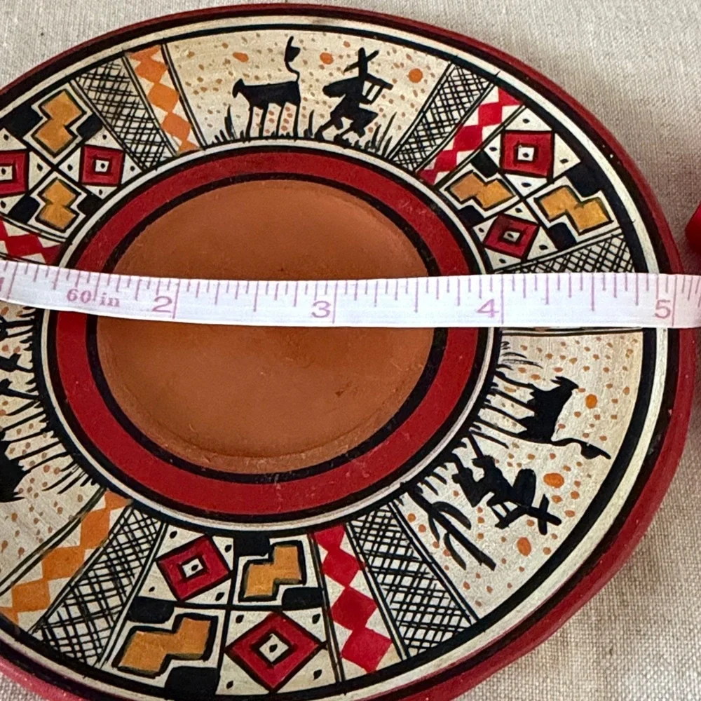 Peruvian cup and saucer. Inca Pottery
